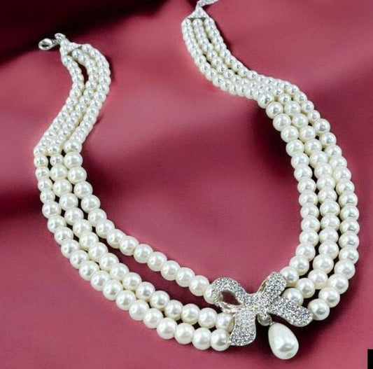 Triple-Strand Pearl Bow Necklace