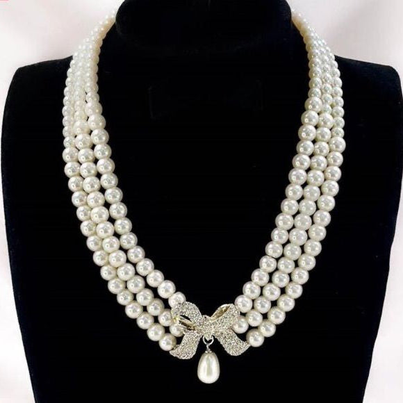 Triple-Strand Pearl Bow Necklace