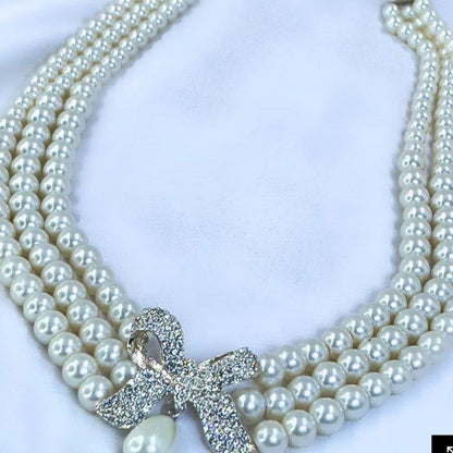 Triple-Strand Pearl Bow Necklace
