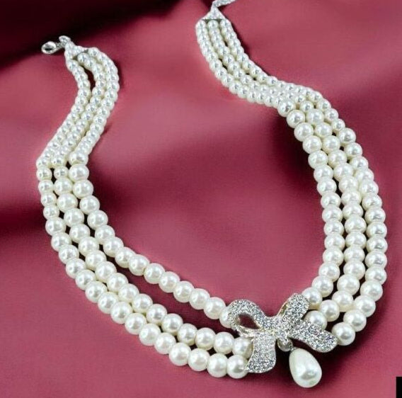 Triple-Strand Pearl Bow Necklace
