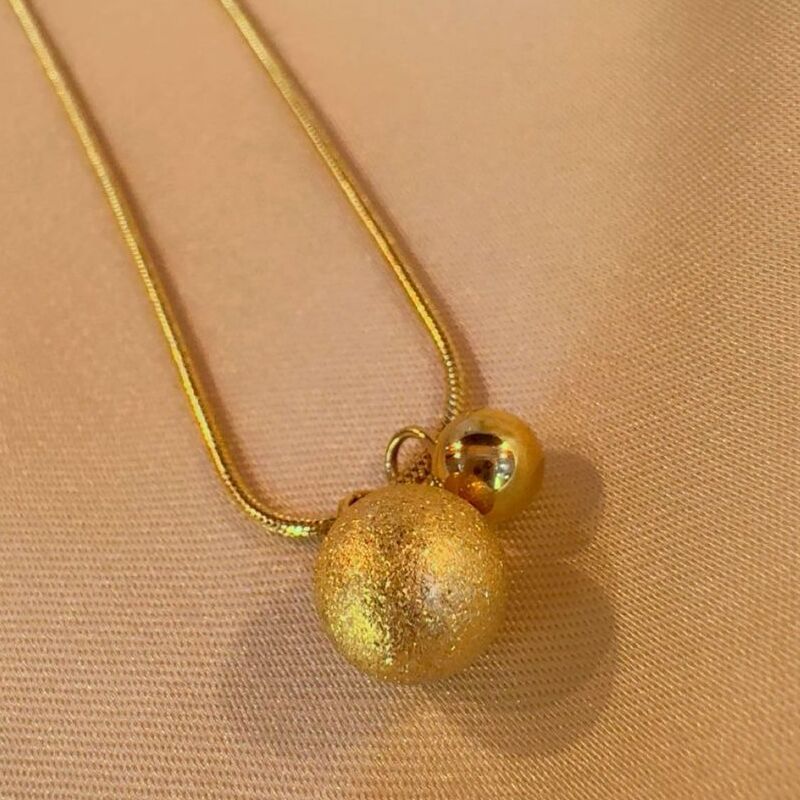 Golden ball pendent