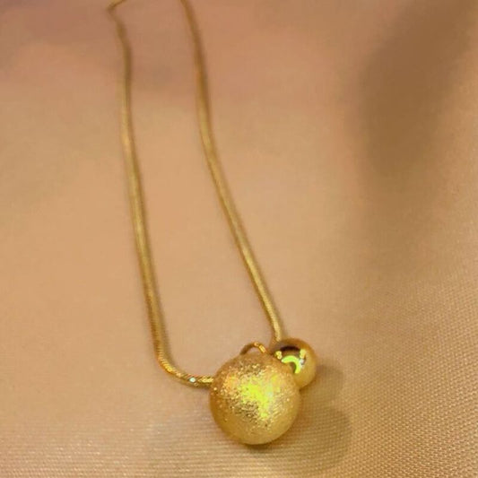 Golden ball pendent
